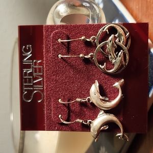 Two pair dolphin earrings.